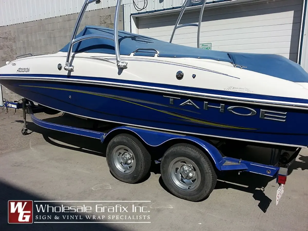 Blue Tahoe bowrider with printed hull striping