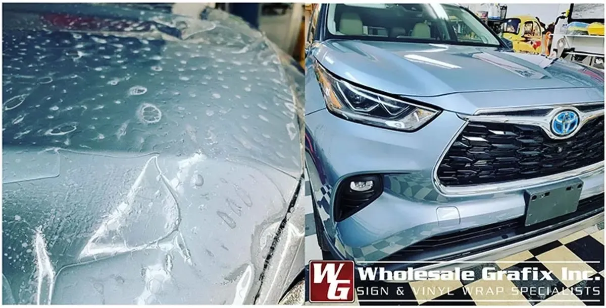Paint protection film being laid across a vehicle hood