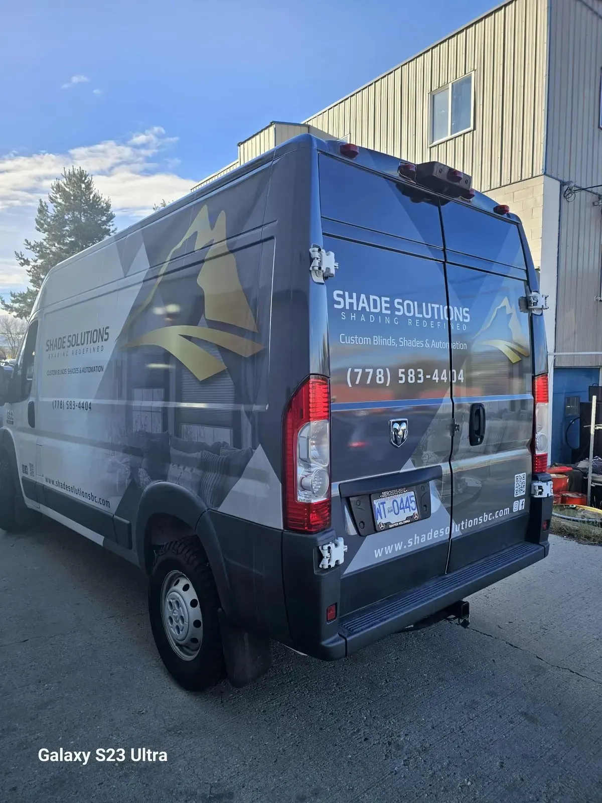 Shade Solutions cargo van showing the full length of a printed fleet wrap